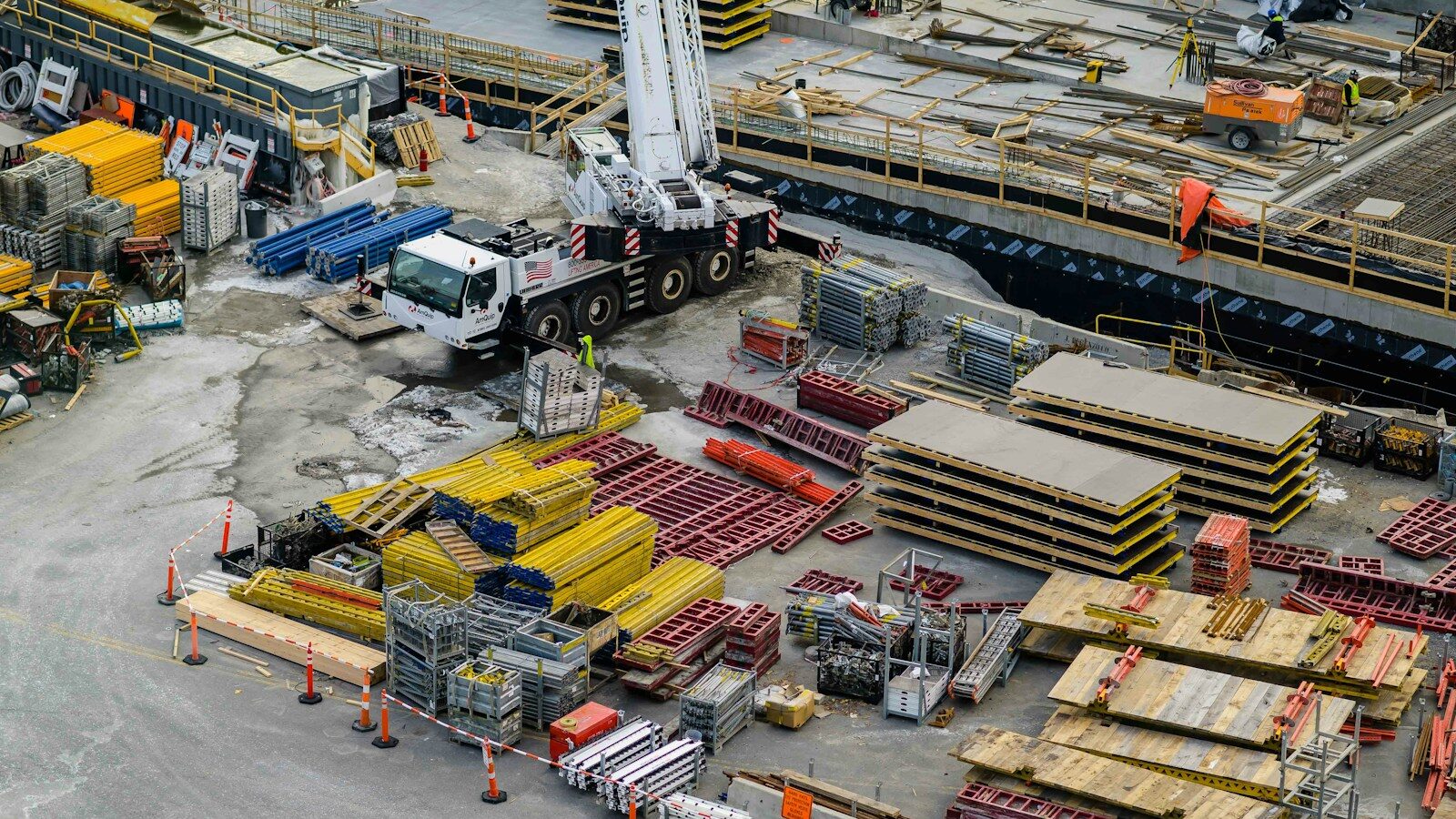 a construction site with a crane and construction equipment